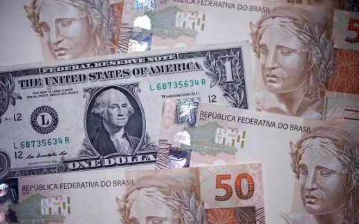 Dólar dispara com medo de guerra comercial e bolsas despencam pelo mundo